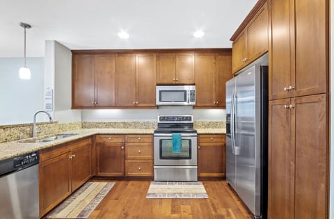 Kitchen with stainless steel appliances and granite countertops