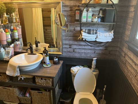 Cottage bathroom with shower.