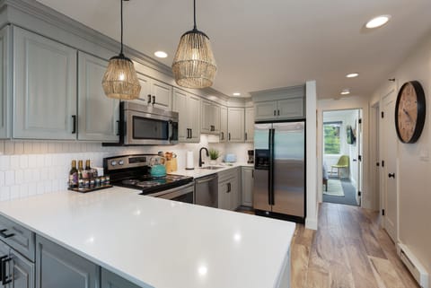 Luxurious kitchen stocked with everything you need to cook a gourmet meal.