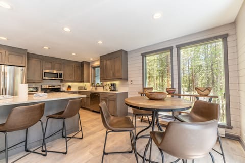 Seating for eight at the breakfast bar and table.