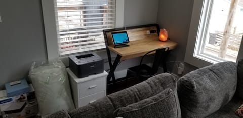 Laptop ready desk with Echo Show, printer and 24" monitor (not shown).