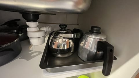 Microwave, coffee/tea maker, cookware/dishes/utensils