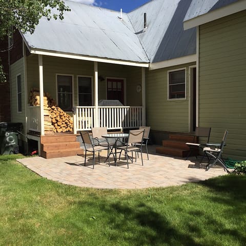 Back patio great for enjoying a meal or roasting s'mores with our fire pit