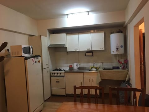 Fridge, microwave, toaster, cookware/dishes/utensils