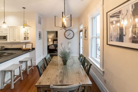 dining and kitchen facing primary bedroom