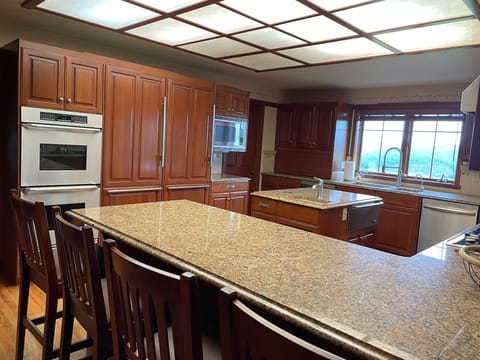 4 bar stools so the one(s) doing the cooking can have some company.