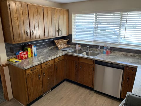 Newly updated kitchen with new dishwasher, microwave, and range.