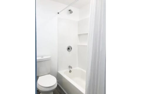 Combined shower/tub, hair dryer, towels, soap