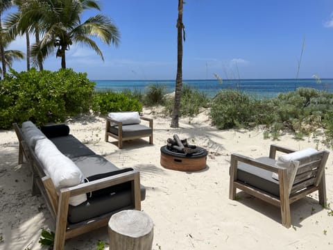 On the beach, sun loungers, beach towels