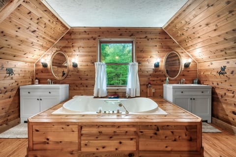 Bathtub, jetted tub, hair dryer, towels