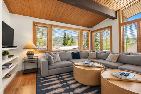 The blue skies of summer stream sunshine into the living space all day long!