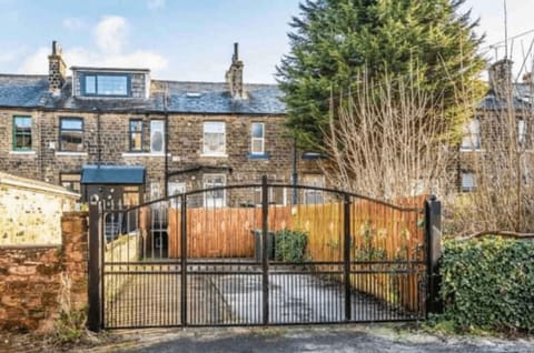 Secure gated parking with back patio