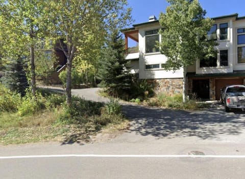 Exterior from street...a duplex with the left side being the offered property.