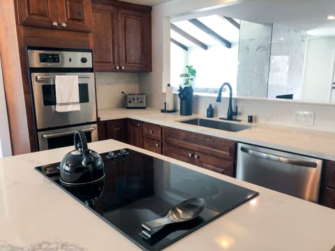 Double ovens and new appliances in the kitchen. 