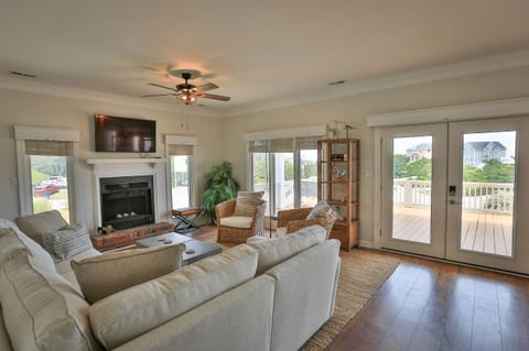 Smart TV, fireplace, books