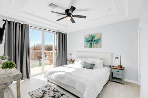 The master bedroom leads way to the outdoor patio.