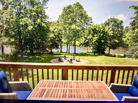 Your private deck overlooking the riverfront 1 acre property and 2  fire pits 