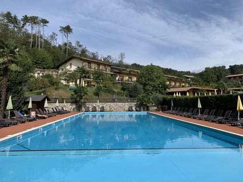 Water, Sky, Cloud, Plant, Building, Swimming Pool, Azure, Chair, House, Body Of Water