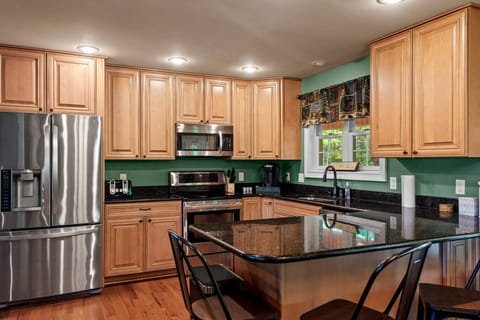kitchen with all new appliances. Fully Equipped and easy to use. Keurig with k-cup, tea, and hot chocolate provided.