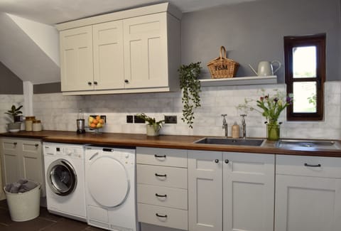 Spacious utility room ideal for families and large groups