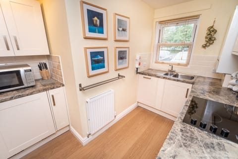 A well maintained kitchen with everything that you need to cook up a storm