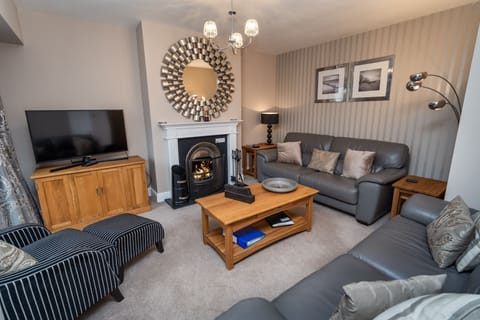 A beautiful living area at the rear of the property