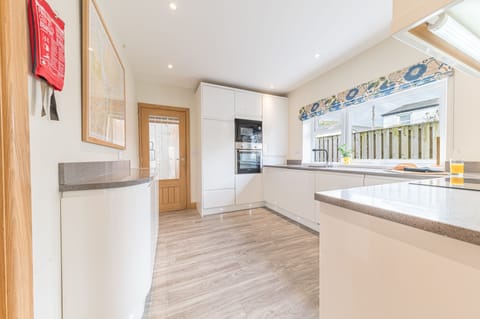 From the dining room you enter the spacious kitchen