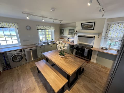 Fridge, oven, dishwasher, dining tables