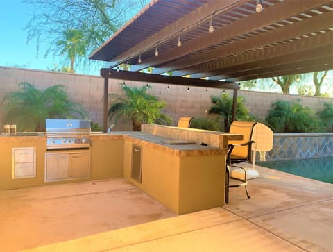 Entertainer's backyard with built-in kitchen and bar
