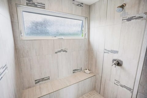 Combined shower/tub, hair dryer, towels, soap