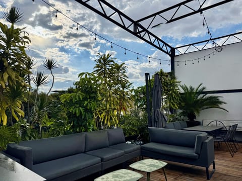 Outdoor dining area on the rooftop terrace