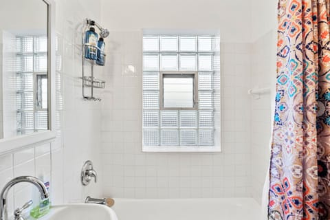 Combined shower/tub, hair dryer, towels, soap