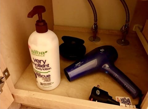 Eco-friendly toiletries, hair dryer, towels, soap