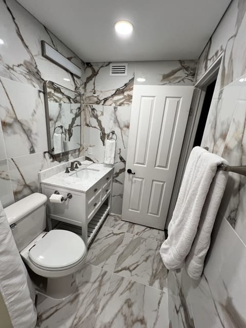 Combined shower/tub, hair dryer, towels, soap