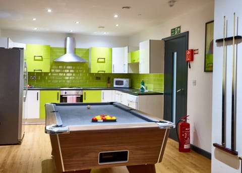 Kitchen featuring snooker table