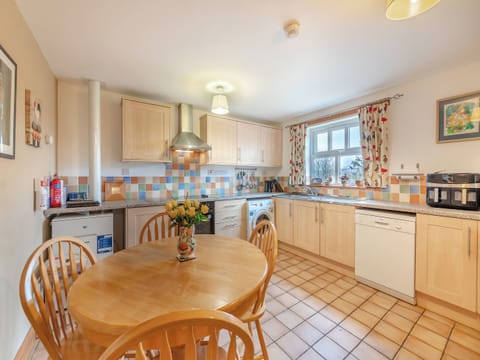 Large, well-equipped kitchen and dining area | Nelly&rsquo;s Cottage - Low Cornriggs Farm, Cowshill, near Alston