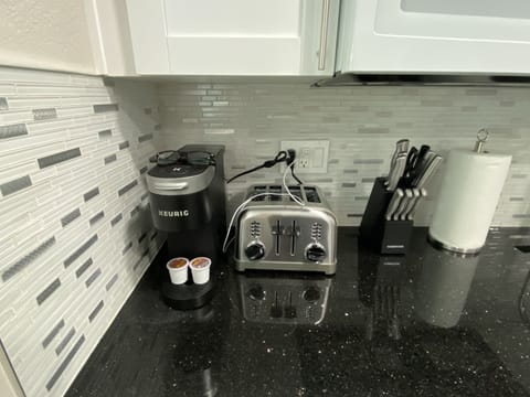 Microwave, stovetop, coffee/tea maker, toaster