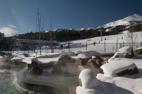 View of lift from heated outdoor pool during the day.