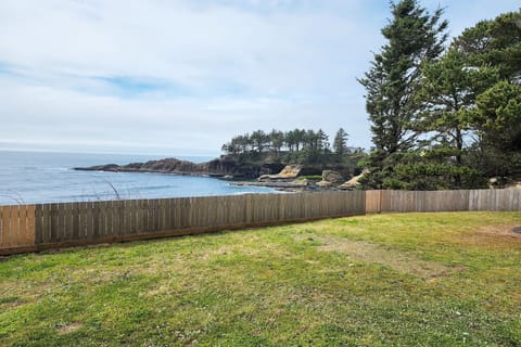 Large grassy yard for outdoor family fun.