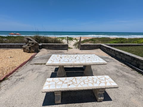 On the beach, sun loungers, beach towels