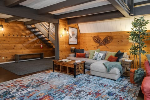 Hang up your coat + head to the living room to check the game or hang with fam!