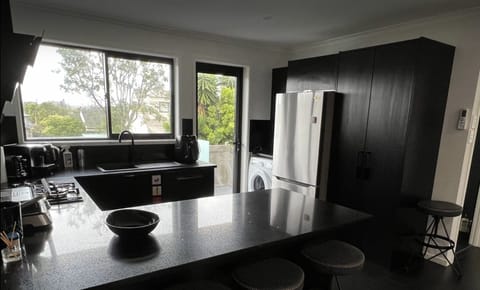 kitchen with grill, coffee machine, toaster, kettle, air fryer and lot of other