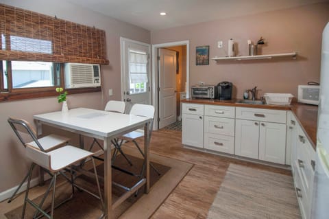 Kitchen area and window AC.