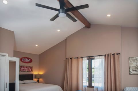 High ceilings in living/bed area.