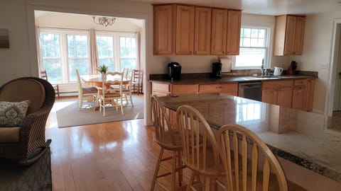 Breakfast island looking into dinning room. Table seats 8 