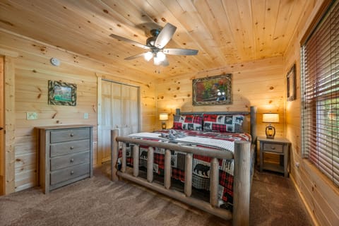 Upstairs bedroom on the back side of the cabin with king-size bed.