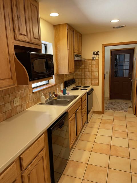 Not only will you have a grill outside, but a full country kitchen with appliances, utensils, cookware, and serving ware inside!