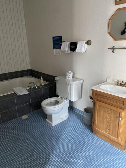 Jetted tub, hair dryer, towels, soap