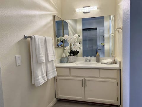 Combined shower/tub, hair dryer, towels, soap