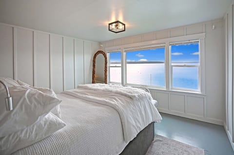 Enjoy the view of the Saratoga Passage right from bed.
